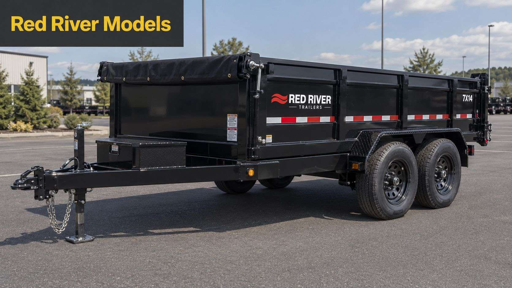 A black Red River dump trailer parked in a lot during the daytime, showcasing its side profile.